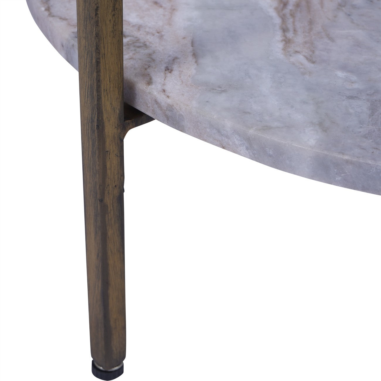Close-up of a marble table with a antique brass finish leg on a white background