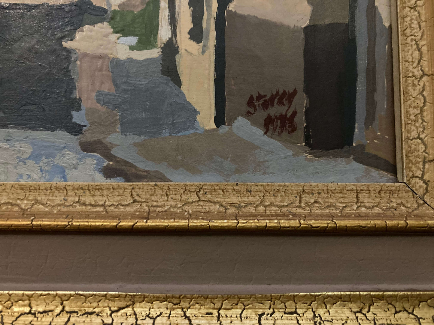 Close-up of a signed textured painting with a gold frame by Warren Storey