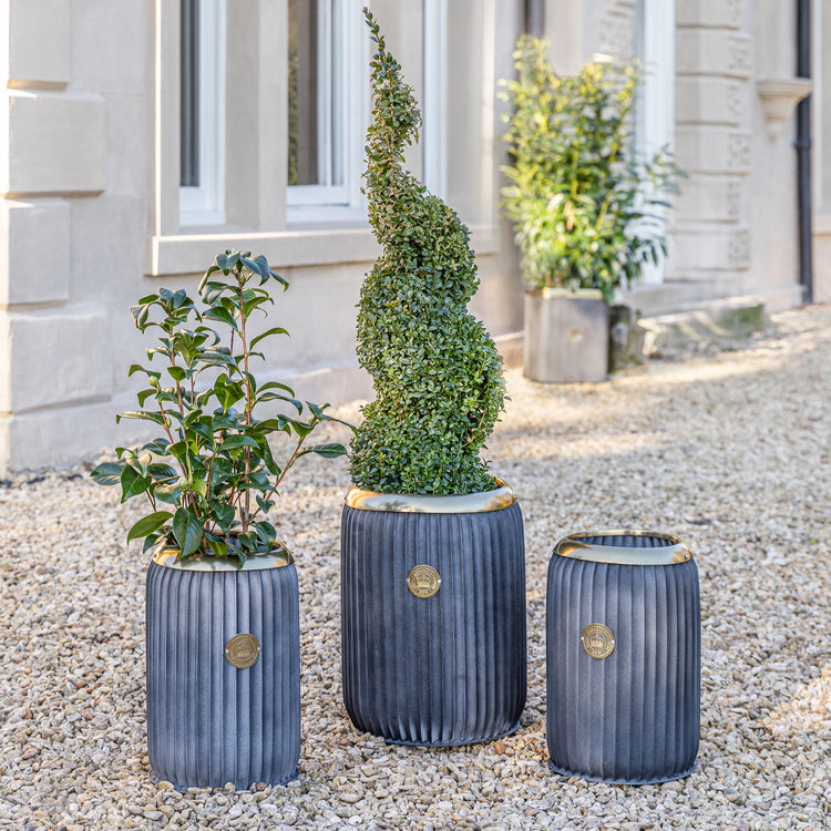 Kew Antique Lead Richmond Planter display